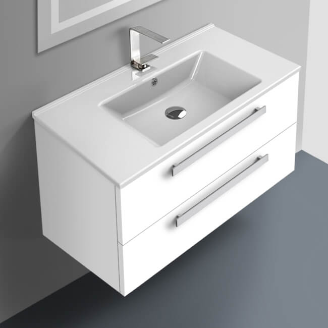 white bathroom vanity with glass wash basin
